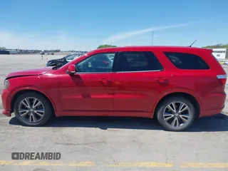 2013 Dodge Durango R/T with VIN 1C4SDJCTXDC697240, listed as a IAAI auction lot 42209558 with 130,735 mi miles and . Bid and sale history available at DreamBid. Image 14.
