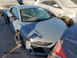 2022 Audi R8 z VIN WUAKBAFX5N7901301, wystawiony jako Copart lot #76451354 z przebiegiem Nie podano mil oraz Nie do naprawy • Non repairable. Historia ofert i sprzedaży dostępna na DreamBid. Obrazek 5.