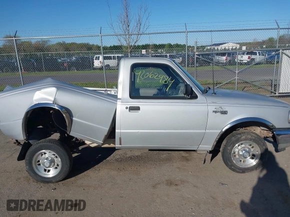 1996 Ford Ranger XL with VIN 1FTCR10A8TTA22056, listed as a IAAI auction lot 42062984 with 215,030 mi miles and . Bid and sale history available at DreamBid. Image 13.