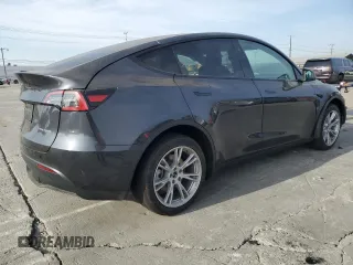 2024 Tesla Model Y Long Range with VIN 7SAYGDEE8RF089456, listed as a Copart auction lot 85521934 with 13,837 mi miles and Salvage title. Bid and sale history available at DreamBid. Image 3.
