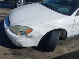 2003 Ford Taurus SE Standard with VIN 1FAFP53293G270314, listed as a IAAI auction lot 41840424 with 171,840 mi miles. Bid and sale history available at carsss.com. Image 16.
