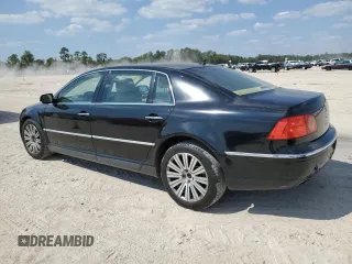 2005 Volkswagen Phaeton z VIN WVWAF03D658003589, wystawiony jako Copart lot #74049134 z przebiegiem 124 506 mil mil oraz Tytuł czysty. Historia ofert i sprzedaży dostępna na DreamBid. Obrazek 2.