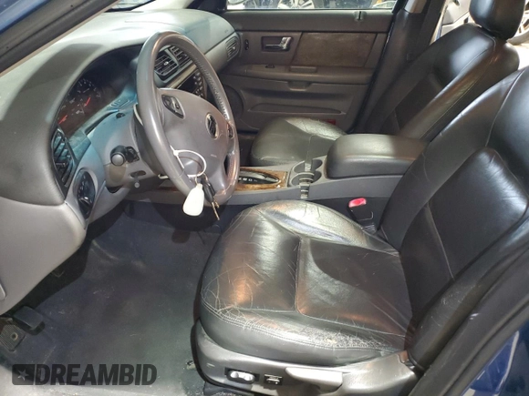 2002 Mercury Sable LS with VIN 1MEHM55S12A654810, listed as a Copart auction lot 83073514 with 185,246 mi miles and Salvage Title. Bid and sale history available at DreamBid. Image 7.