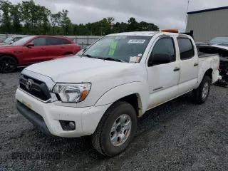 2014 Toyota Tacoma with VIN 3TMLU4ENXEM140896, listed as a Copart auction lot 58169105 with 205,363 mi miles and Clean title. Bid and sale history available at DreamBid. Image 1.