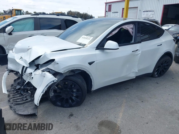 2023 Tesla Model Y Long Range with VIN 7SAYGDEE9PA026005, listed as a IAAI auction lot 41895223 with 43,813 mi miles and . Bid and sale history available at DreamBid. Image 17.