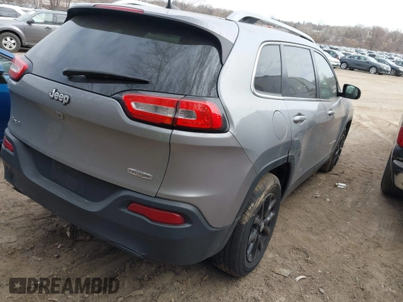 2016 Jeep Cherokee Latitude with VIN 1C4PJMCB7GW252724, listed as a IAAI auction lot 41869060 with 125,119 mi miles. Bid and sale history available at carsss.com. Image 4.