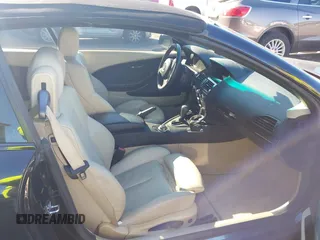 2007 BMW 6 Series 650i with VIN WBAEK13507CN84354, listed as a IAAI auction lot 41604376 with 97,956 mi miles. Bid and sale history available at carsss.com. Image 5.