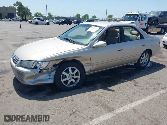 2001 Toyota Camry CE with VIN JT2BG22K910605420, listed as a IAAI auction lot 42109747 with 89,426 mi miles and . Bid and sale history available at DreamBid. Image 2.