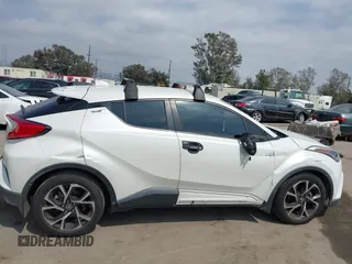 2019 Toyota C-HR XLE with VIN JTNKHMBX9K1054053, listed as a IAAI auction lot 42120256 with 67,083 mi miles and . Bid and sale history available at DreamBid. Image 13.