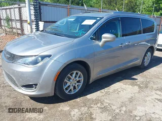 2020 Chrysler Pacifica Touring L with VIN 2C4RC1BG7LR140622, listed as a IAAI auction lot 42090987 with 125,377 mi miles and . Bid and sale history available at DreamBid. Image 17.