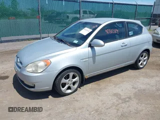 2007 Hyundai Accent SE z VIN KMHCN36C67U007308, wystawiony jako IAAI lot #42312114 z przebiegiem 105 096 mil mil oraz . Historia ofert i sprzedaży dostępna na DreamBid. Obrazek 2.