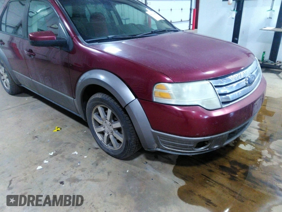 2008 Ford Taurus X SEL with VIN 1FMDK05W98GA37104, listed as a IAAI auction lot 42123902 with 166,739 mi miles and . Bid and sale history available at DreamBid. Image 6.