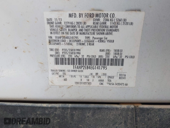 2014 Ford Taurus SEL with VIN 1FAHP2E84EG141795, listed as a IAAI auction lot 42133668 with 154,009 mi miles and . Bid and sale history available at DreamBid. Image 9.