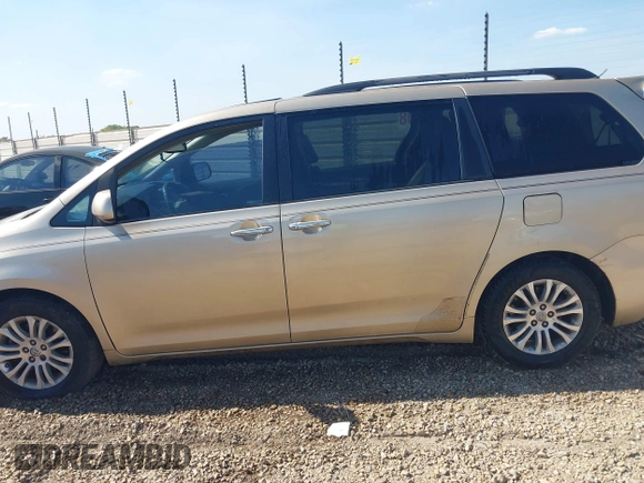 2011 Toyota Sienna XLE AAS with VIN 5TDYK3DC4BS013644, listed as a IAAI auction lot 41905759 with 208,800 mi miles and . Bid and sale history available at DreamBid. Image 14.