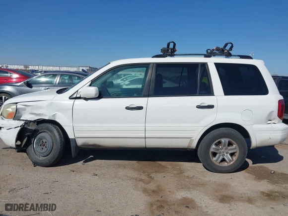 2005 Honda Pilot EX-L with NAVI with VIN 2HKYF18775H571312, listed as a IAAI auction lot 41830609 with 297,923 mi miles. Bid and sale history available at carsss.com. Image 14.