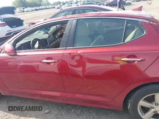 2015 Kia Optima LX z VIN 5XXGM4A75FG503066, wystawiony jako IAAI lot #42007170 z przebiegiem 128 918 mil mil oraz . Historia ofert i sprzedaży dostępna na DreamBid. Obrazek 14.