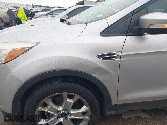 2013 Ford Escape SEL with VIN 1FMCU0H99DUC72013, listed as a IAAI auction lot 41952599 with 177,081 mi miles. Bid and sale history available at carsss.com. Image 6.