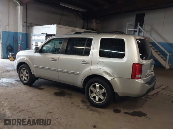 2009 Honda Pilot Touring with VIN 5FNYF48929B010331, listed as a IAAI auction lot 41965094 with 142,490 mi miles and . Bid and sale history available at carsss.com. Image 6.