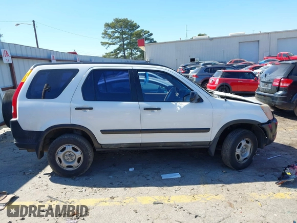 2002 Honda CR-V LX with VIN SHSRD68482U002257, listed as a IAAI auction lot 41644489 with 290,000 mi miles and . Bid and sale history available at carsss.com. Image 13.