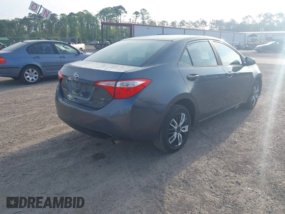 2015 Toyota Corolla L with VIN 5YFBURHE0FP283354, listed as a IAAI auction lot 41530183 with 165,228 mi miles and . Bid and sale history available at DreamBid. Image 4.
