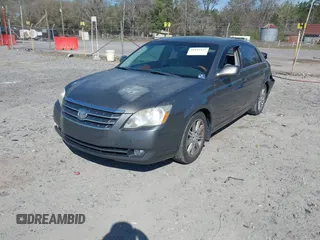 2005 Toyota Avalon XL with VIN 4T1BK36B25U028603, listed as a IAAI auction lot 41832427 with 154,495 mi miles and . Bid and sale history available at DreamBid. Image 2.