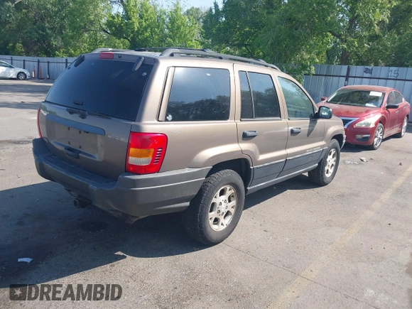 2001 Jeep Grand Cherokee Laredo with VIN 1J4GW48S81C694537, listed as a IAAI auction lot 42447828 with 162,981 mi miles and . Bid and sale history available at DreamBid. Image 4.