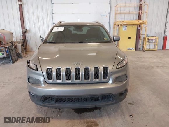2014 Jeep Cherokee Latitude with VIN 1C4PJLCS1EW106004, listed as a IAAI auction lot 41786457 with 145,588 mi miles. Bid and sale history available at carsss.com. Image 12.