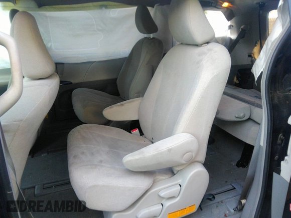 2014 Toyota Sienna L with VIN 5TDZK3DC2ES449563, listed as a IAAI auction lot 37355441 with 246,582 mi miles and . Bid and sale history available at DreamBid. Image 8.