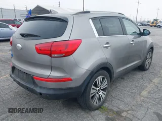 2014 Kia Sportage EX with VIN KNDPC3AC9E7571730, listed as a IAAI auction lot 42164657 with 77,045 mi miles and . Bid and sale history available at DreamBid. Image 4.