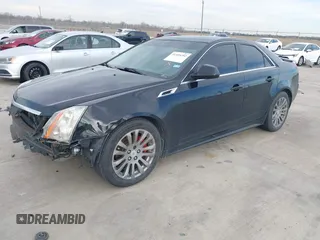 2013 Cadillac CTS Performance with VIN 1G6DJ5E37D0156897, listed as a IAAI auction lot 41359292 with 152,051 mi miles and . Bid and sale history available at DreamBid. Image 2.