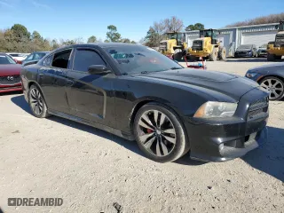 2012 Dodge Charger SRT8 with VIN 2C3CDXEJ4CH228471, listed as a Copart auction lot 82397844 with 125,437 mi miles and Salvage Title. Bid and sale history available at carsss.com. Image 4.