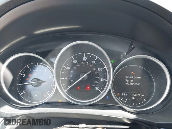 2019 Mazda CX-5 Sport with VIN JM3KFABM7K1509987, listed as a IAAI auction lot 42062804 with 50,898 mi miles and . Bid and sale history available at DreamBid. Image 16.