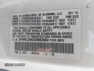 2012 Honda Odyssey EX-L with VIN 5FNRL5H63CB063684, listed as a IAAI auction lot 42576742 with 170,656 mi miles and . Bid and sale history available at DreamBid. Image 9.
