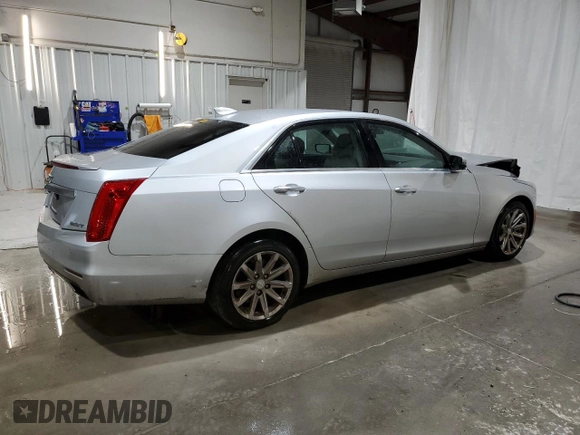 2015 Cadillac CTS AWD with VIN 1G6AW5SX2F0111350, listed as a Copart auction lot 82567214 with 116,936 mi miles and Salvage title. Bid and sale history available at DreamBid. Image 3.