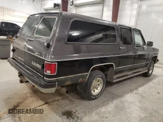 1991 GMC Suburban z VIN 1GKEV16K5MF500359, wystawiony jako Copart lot #81125224 z przebiegiem 177 181 mil mil oraz Tytuł czysty. Historia ofert i sprzedaży dostępna na DreamBid. Obrazek 3.
