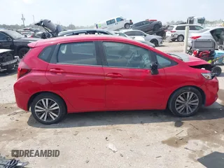 2015 Honda Fit EX-L z VIN 3HGGK5H86FM719146, wystawiony jako IAAI lot #42276633 z przebiegiem 155 515 mil mil oraz . Historia ofert i sprzedaży dostępna na DreamBid. Obrazek 13.