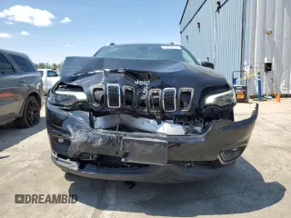 2019 Jeep Cherokee Latitude Plus with VIN 1C4PJMLBXKD233718, listed as a Copart auction lot 58933435 with 56,413 mi miles and Salvage title. Bid and sale history available at DreamBid. Image 5.