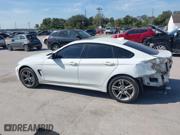 2016 BMW 4 Series 435i xDrive with VIN WBA4B3C58GG528016, listed as a IAAI auction lot 41506077 with 87,975 mi miles and . Bid and sale history available at DreamBid. Image 14.