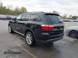 2013 Dodge Durango Crew with VIN 1C4RDHDG8DC592706, listed as a IAAI auction lot 40745114 with 95,757 mi miles and . Bid and sale history available at DreamBid. Image 3.