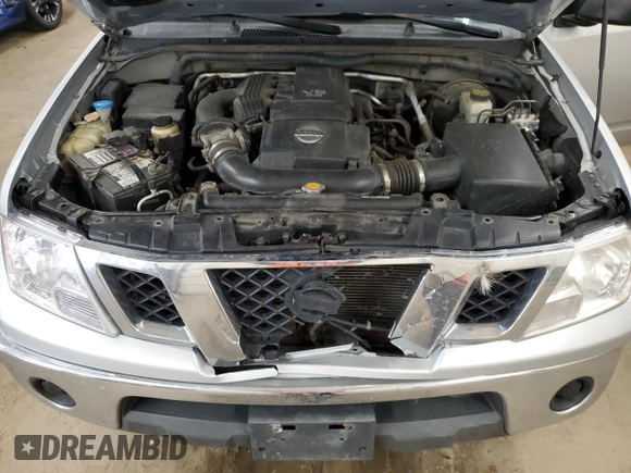 2010 Nissan Frontier SE with VIN 1N6AD0CW0AC429029, listed as a Copart auction lot 52036995 with 180,166 mi miles and Salvage title. Bid and sale history available at DreamBid. Image 11.