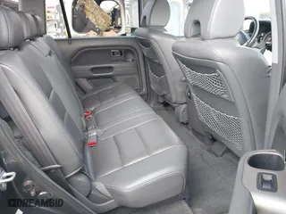 2006 Honda Pilot EX-L with VIN 2HKYF18536H538744, listed as a IAAI auction lot 42025277 with 203,012 mi miles. Bid and sale history available at carsss.com. Image 8.
