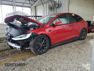 2023 Tesla Model X with VIN 7SAXCBE52PF365140, listed as a Copart auction lot 44564965 with 27,107 mi miles and Salvage Title. Bid and sale history available at DreamBid. Image 1.