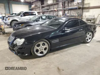 2005 Mercedes-Benz SL 500 with VIN WDBSK75F35F091129, listed as a Copart auction lot 81311174 with 112,490 mi miles and Salvage Title. Bid and sale history available at DreamBid. Image 1.