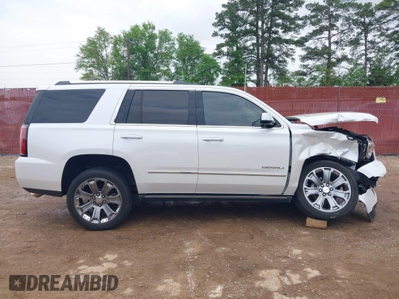 2016 GMC Yukon Denali with VIN 1GKS1CKJ7GR237852, listed as a IAAI auction lot 41944398 with 65,703 mi miles. Bid and sale history available at carsss.com. Image 14.
