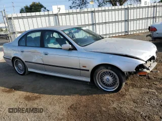 2000 BMW 5 Series 528iA with VIN WBADM6345YGU29738, listed as a Copart auction lot 75176334 with 160,821 mi miles and Salvage Title. Bid and sale history available at carsss.com. Image 4.