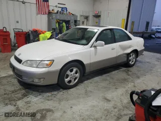 1999 Lexus ES 300 Luxury Sport Sdn with VIN JT8BF28G0X0233986, listed as a Copart auction lot 82440944 with 129,656 mi miles and Salvage Title. Bid and sale history available at carsss.com. Image 1.