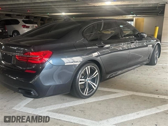 2016 BMW 7 Series 750i xDrive with VIN WBA7F2C51GG415746, listed as a Copart auction lot 50784393 with 73,117 mi miles. Bid and sale history available at carsss.com. Image 4.