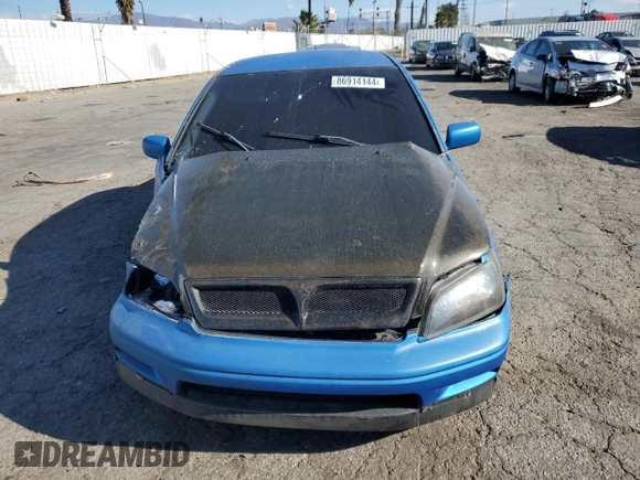 2002 Mitsubishi Lancer OZ-Rally z VIN JA3AJ86E62U070034, wystawiony jako Copart lot #86914144 z przebiegiem 180 675 mil mil oraz Szkoda całkowita • Salvage title. Historia ofert i sprzedaży dostępna na DreamBid. Obrazek 5.