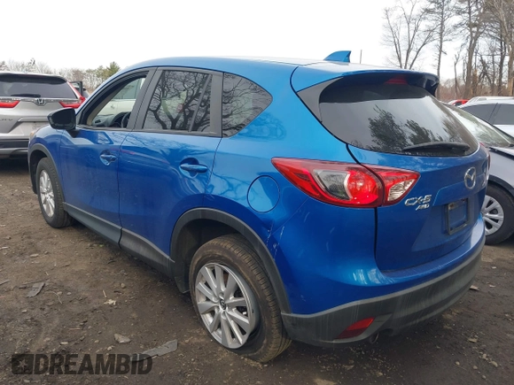 2013 Mazda CX-5 Touring with VIN JM3KE4CE0D0160711, listed as a IAAI auction lot 41843658 with 65,391 mi miles. Bid and sale history available at carsss.com. Image 3.