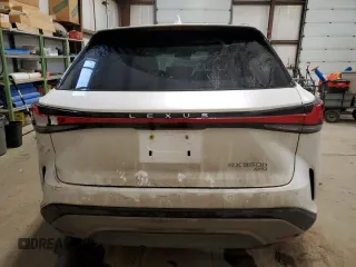 2023 Lexus RX with VIN 2T2BBMCA2PC014251, listed as a Copart auction lot 40668384 with 9,395 mi miles and Salvage Title. Bid and sale history available at carsss.com. Image 6.